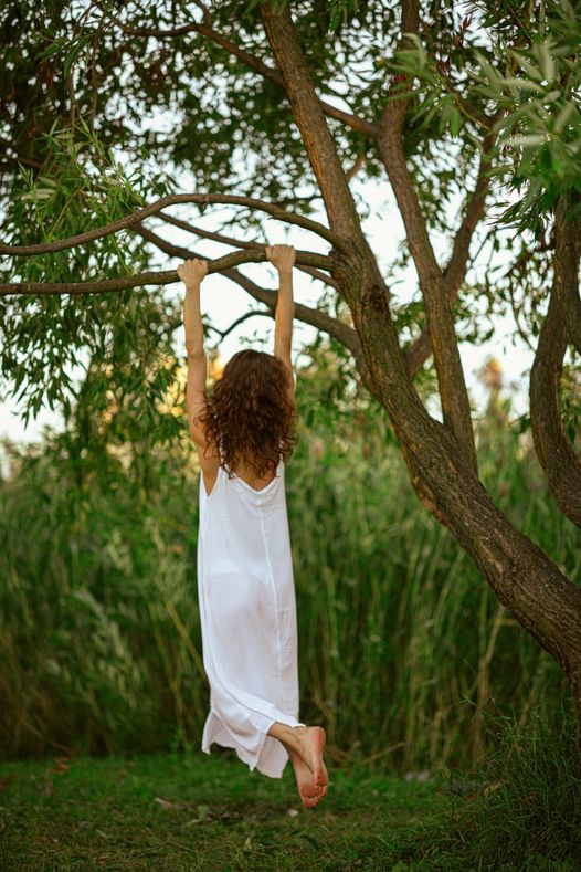 May be an image of 1 person, child and Angel Oak tree