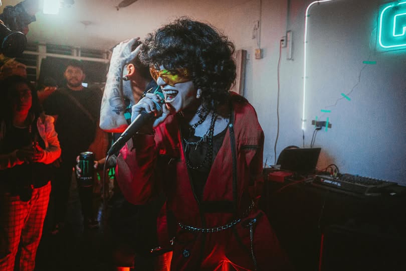 May be an image of 3 people and speaker